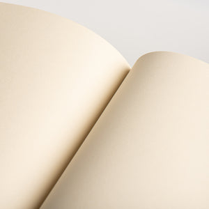 A5 notebook with plain 110gsm recycled pages in a distinctive book white shade